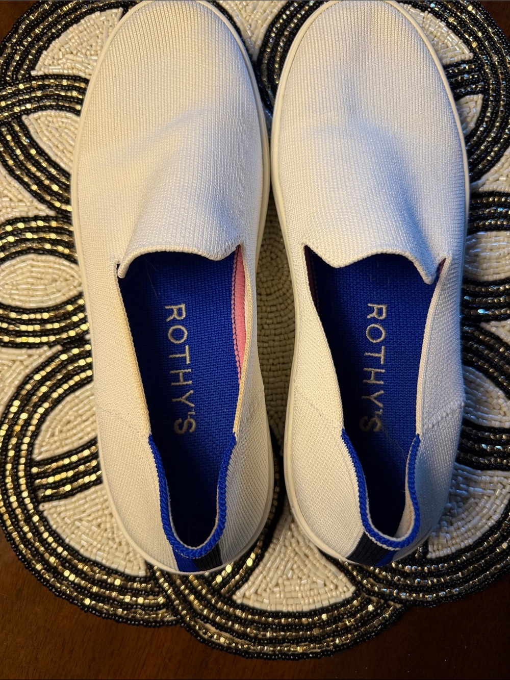 Rothy's White Slip-On Shoes with Blue Insole and Pink Accent